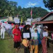 Bentangkan Bendera Raksasa, Pemuda Oba Selatan Titip 8 Tuntutan untuk Pemkot Tidore