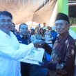 Ubaid Serahkan 6 Unit Rumah untuk Korban Banjir di Desa Gaifoli, Halmahera Timur