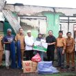 Sekda Ternate Serahkan Bantuan Korban Banjir dan Kebakaran, Minta Respons Cepat Penanganan