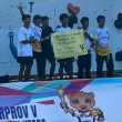 Atlet Panjat Tebing Bentangkan Poster Protes Tambang di Porprov Maluku Utara